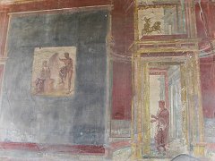 Сохранившаяся фреска на стенах домов в Помпеях
